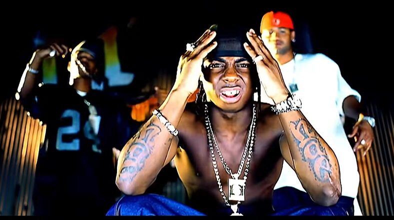 Lil Wayne with Juvenile and B.G. in "Tha Block Is Hot" music video.