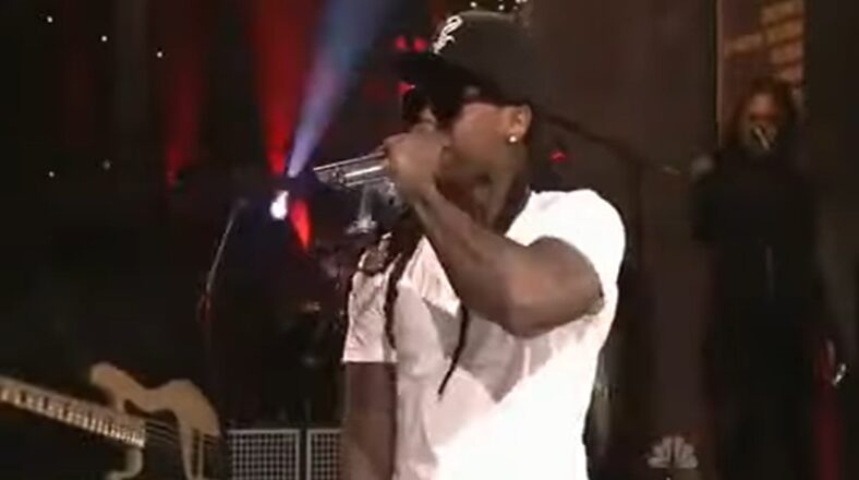 Lil Wayne on stage with Eminem, performing "No Love," on Saturday Night Live.