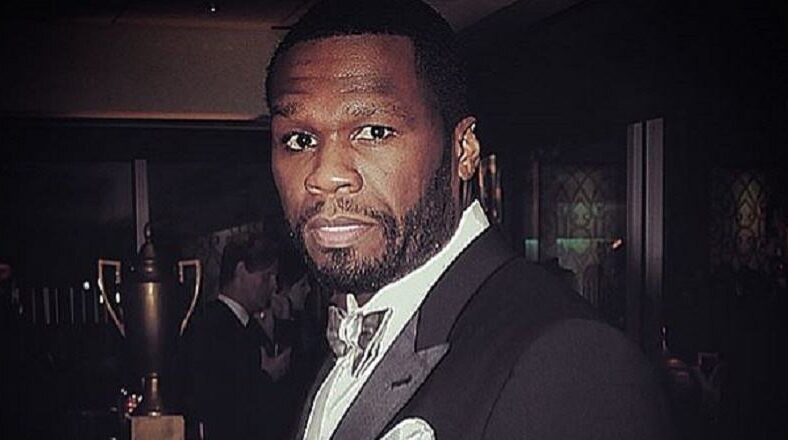 50 Cent takes photo in front of $43 million in cash
