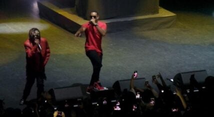 Ludacris performing on stage at a concert