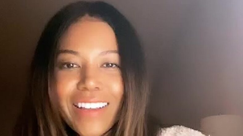 Amerie smiles during her Instagram video addressing look-alike comparisons with Kourtney Kardashian.