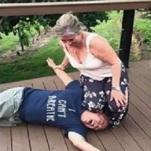 Paula McGuian, the owner of Home Spray Foam & Installation, LLC, is the latest person to mock George Floyd's death. The small business owner is a native of Eugene, Oregon and she took a photo of herself with her knee on the neck of a young man, wearing an "I Can't Breathe" t-shirt. The woman posted the image on Facebook, with the caption saying "Ready for my Minnesota trip #Asianlivesmatter," very disrespectful to Floyd's memory.