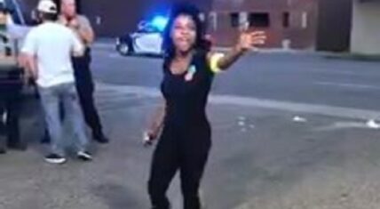 Lyndon C Palmer has gone viral, with a video he shared on Facebook. The video shows a young, black, woman clearly upset, as she is screaming, exiting an ice cream parlor. According to her comments, she was trying to place an order, and she was ignored twice, so she brought up race, and was asked to leave, prompting her to curse, saying the word "f*ck," to which a white man told her not to curse in front of his nine-year-old daughter, which only made the woman more upset. The police were called, with reports of a fight soon to break out, as the woman continued to state her peace, telling the men they were racist, as five police officers arrived on the scene, where she also explained to them what happened. Despite telling her he understood, the officer told her to leave the premises, within five minutes, or he would arrest her, telling her to cross the street. As she left, she waited before crossing the street, as a car was coming, so the Durham police officer ended up arresting her, in all of about thirty seconds, arresting her for trespassing.
