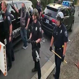 In Springfield, Oregon, the police came, and they confronted the protesters. Footage of the altercation was shared by Cameron Ollivant to Facebook. The footage shows the police officers fighting the protesters, sending two men to the hospital, after breaking their noses.