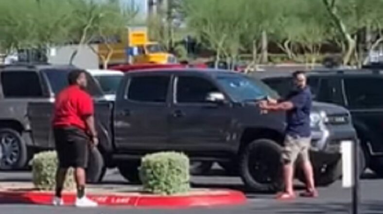 Steven Nowak shared a video on Facebook of two men who got into an altercation. On the video, all that was shown was a white man pointing a gun at a black man, cocking it several times, as the black man hurled insults and slurs at him, egging him onto shoot him. Meanwhile, a man wearing a mask tried to break things up, as onlookers watched. An eyewitness claims the fight broke out, due to the black man nearly running the white man over and, instead of simply talking, jumping out of his vehicle to immediately begin screaming and cursing.