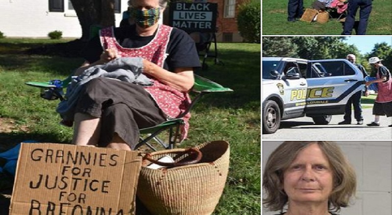 Thomas Merrill, on Facebook, shared photos of a white woman, Mary Holden, getting arrested. The 68-year-old woman is demanding justice for Breonna Taylor. She is doing more than most, camping out in the yard of the Kentucky Attorney General, Daniel Cameron, demanding he further investigate the murder of Breonna Taylor, leading to her arrest for third degree criminal trespassing.