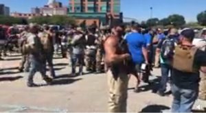 White militia assemble in Louisville, KY, to confront NFAC Militia. NFAC is in town, protesting for Breonna Taylor. Meanwhile, the white protesters are there to confront them, saying they don't start fights, they end them.
