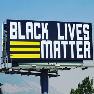 Maria PistolWhiplash Carmichael decided to do something to further the BLM cause. She is a native of Oregon, which is the home of Portland, where protests have turned violent, and people are fighting military police. Long before that, Maria launched a fund going towards purchasing a billboard to place "Black Lives Matter" on it. Finally, the billboard has come to light, and she is showing it off on Facebook, where it's been well-received.