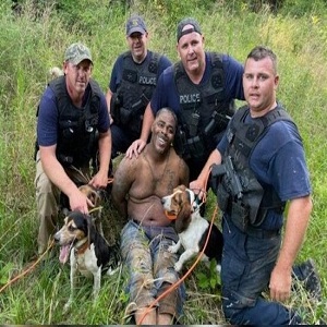 Eric Boykin Mississippi arrest police dogs pose pic