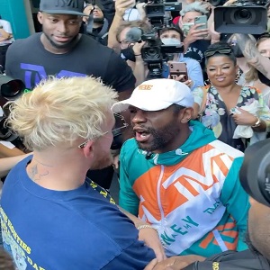 Floyd Mayweather Jake Paul hat fight faceoff
