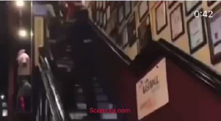 Black woman gets dragged down staircase by security guard