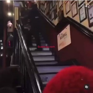 Black woman gets dragged down staircase by security guard