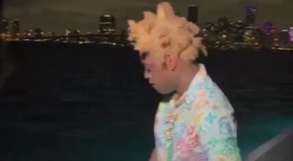 Kodak Black throws 100K into the ocean