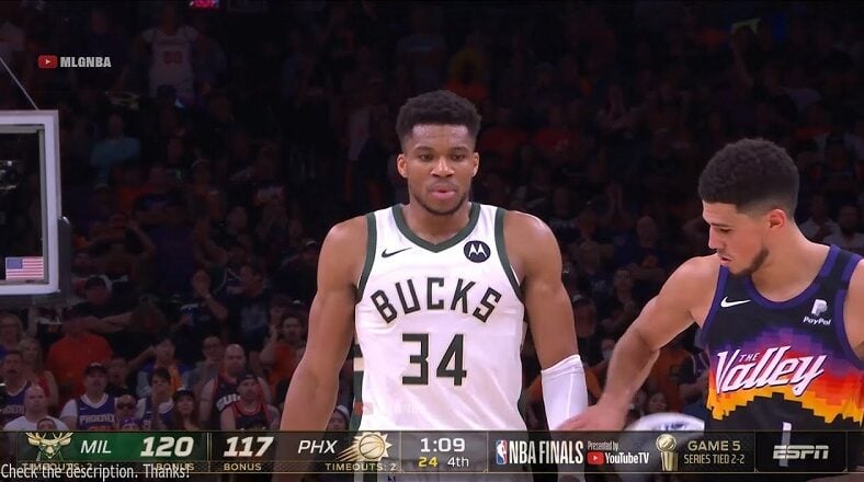 Devin Booker touches Giannis