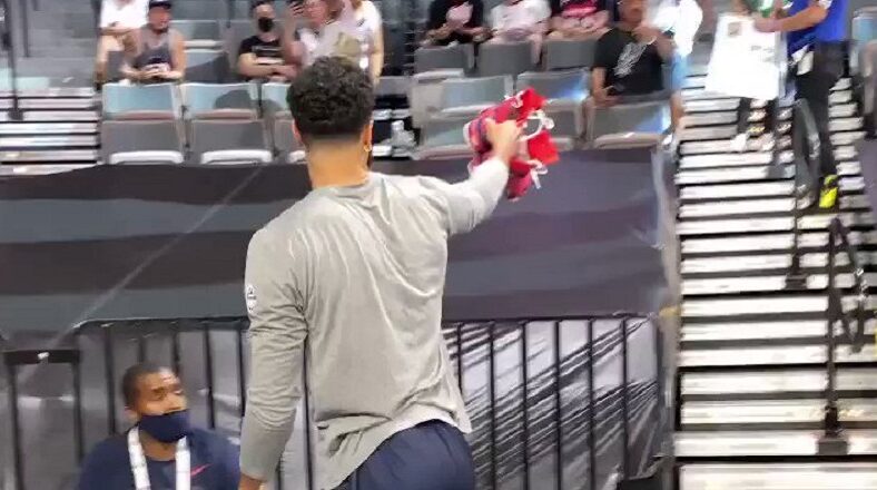 Jayson Tatum gives shoes to girl in the stands