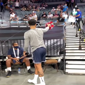 Jayson Tatum gives shoes to girl in the stands