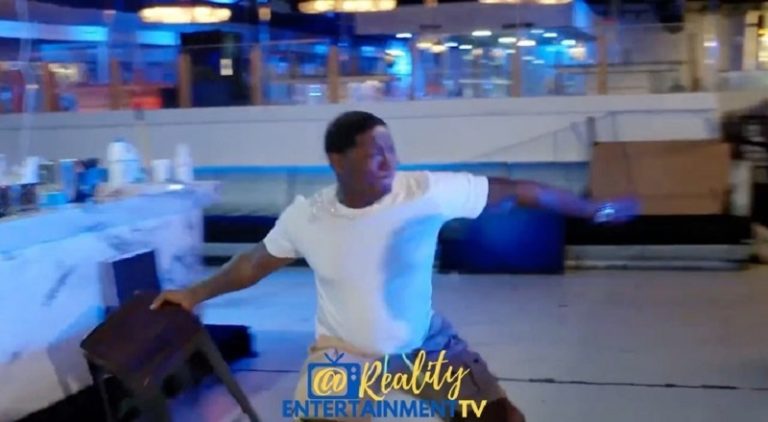 Yung Joc throws a chair and swings on his son