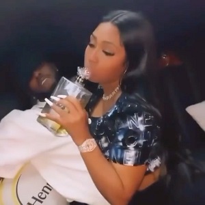 Yung Miami sparks more Diddy dating rumors by sitting on his lap in viral video
