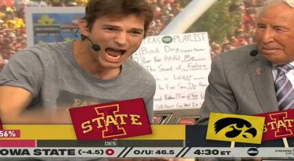 College football fans chant take a shower at Ashton Kutcher as he adds commentary during Iowa State game