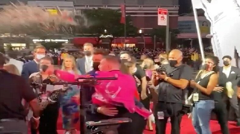 Conor McGregor threw a drink at Machine Gun Kelly, on the VMAs red carpet, and also tried to punch him