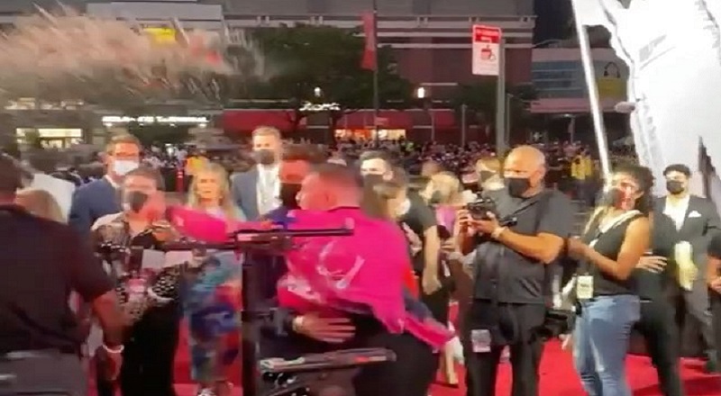 Conor McGregor threw a drink at Machine Gun Kelly, on the VMAs red carpet, and also tried to punch him