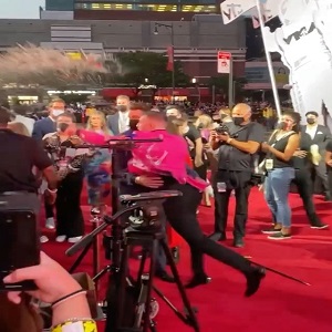 Conor McGregor threw a drink at Machine Gun Kelly, on the VMAs red carpet, and also tried to punch him
