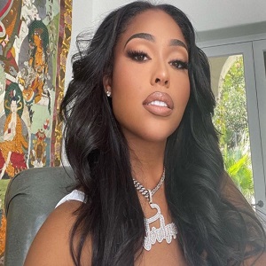 Jordyn Woods gets dragged by Twitter for using before and after pics of herself to promote fitness app; Fans accuse her of having BBL