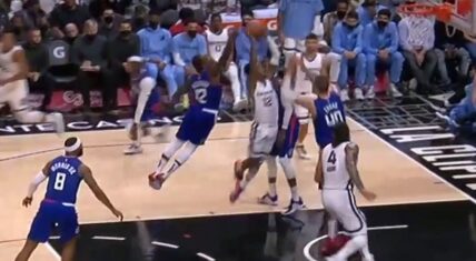 Ja Morant tries to dunk on Ivica Zubac, but Eric Bledsoe blocks him