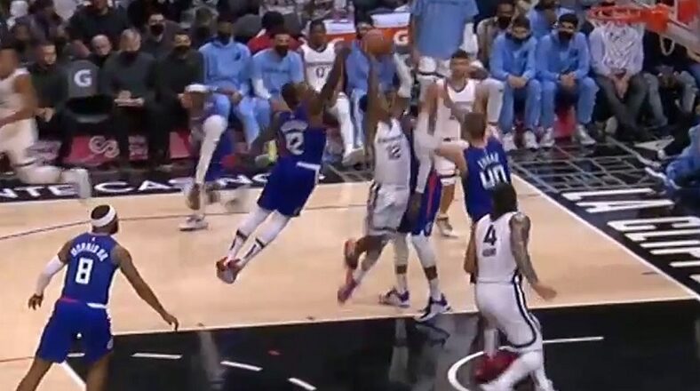 Ja Morant tries to dunk on Ivica Zubac, but Eric Bledsoe blocks him