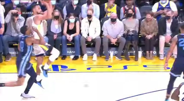 Steph Curry hits long 3-pointer, on one leg!