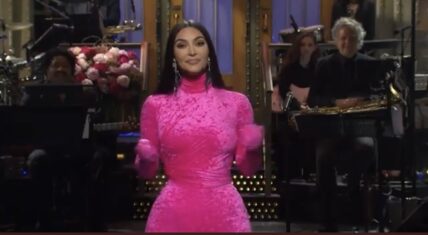 Kim Kardashian delivering her opening monologue on Saturday Night Live, acknowledging Kanye West as the best rapper of all-time.