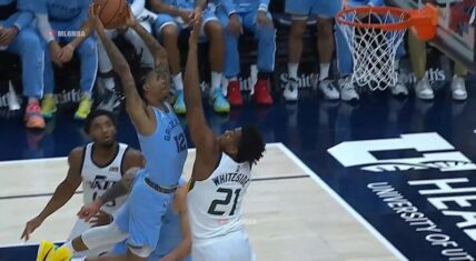 Ja Morant energetically dunks on Hassan Whiteside