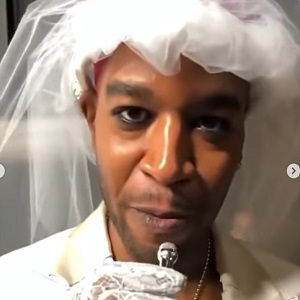 Kid Cudi wears makeup and a dress to CFDA Fashion Awards; Holds hands with boyfriend on red carpet