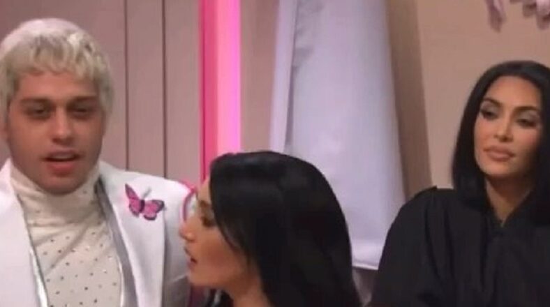 Kim Kardashian jealously watches Pete Davidson kiss another woman in SNL skit