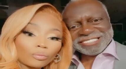 Nicki Minaj playfully pushes up on Karen Huger's husband, Raymond