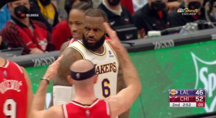LeBron James passes ball of Westbrook's foot and gets the call
