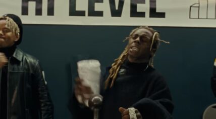 Lil Wayne accused of pulling assault rifle on his bodyguard and is under investigation, but people close to him deny this happened