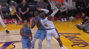 LeBron James dunks on Jaren Jackson