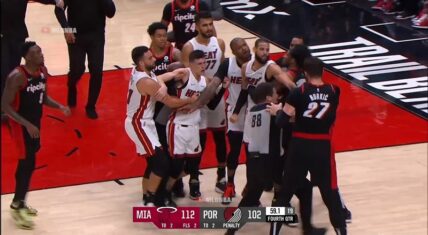 Tyler Herro and Jusuf Nurkic fight