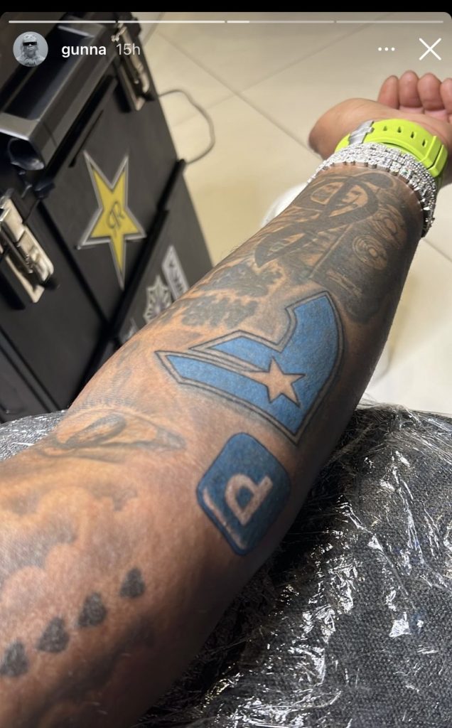 Gunna P emoji tattoo 
