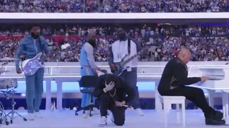 Eminem takes a knee at the Super Bowl after NFL told him not to