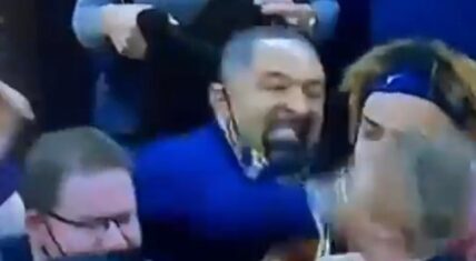 Juwan Howard punches Wisconsin assistant coach causing brawl