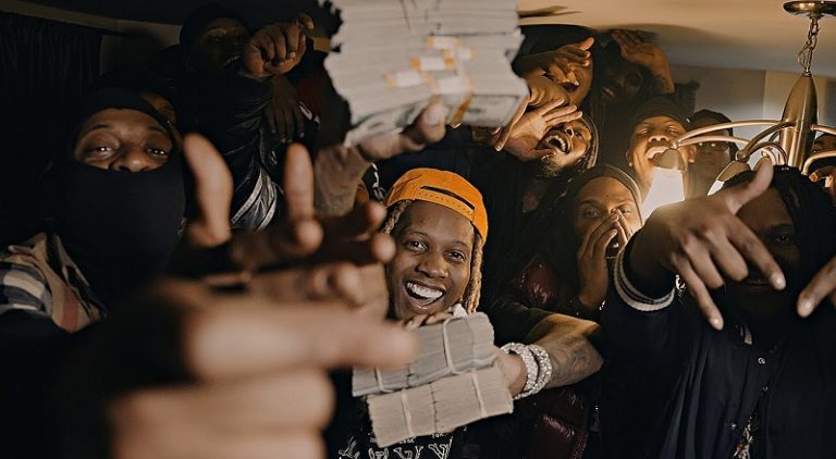 Lil Durk shows off his piles of cash in AHHH HA music video