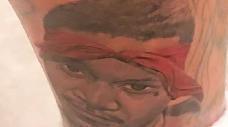 YG gets Slim 400 tattoo