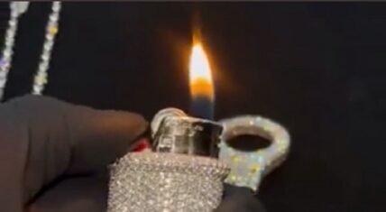 Lil Wayne receives custom diamond encrusted iced out lighter