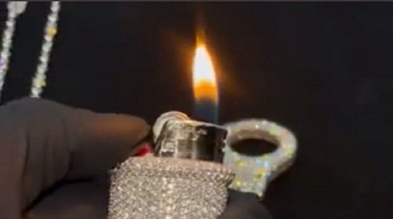 Lil Wayne receives custom diamond encrusted iced out lighter