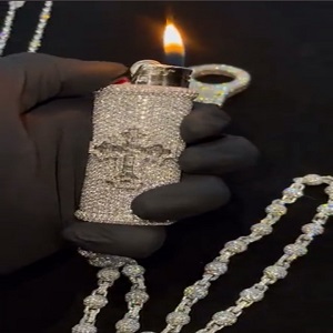 Lil Wayne receives custom diamond encrusted iced out lighter