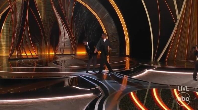 Will Smith punches Chris Rock at Oscars after Jada Pinkett joke
