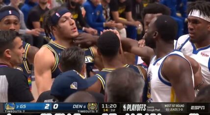 Aaron Gordon tries to fight Draymond Green