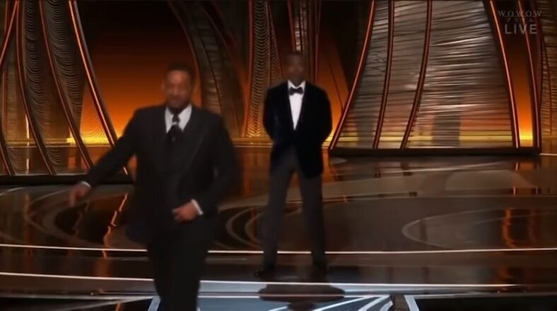 Chris Rock says he won't speak on Will Smith slap until he gets paid